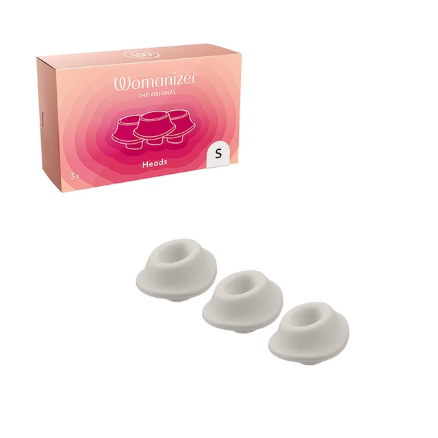Three warm gray Womanizer Type A small heads below retail box