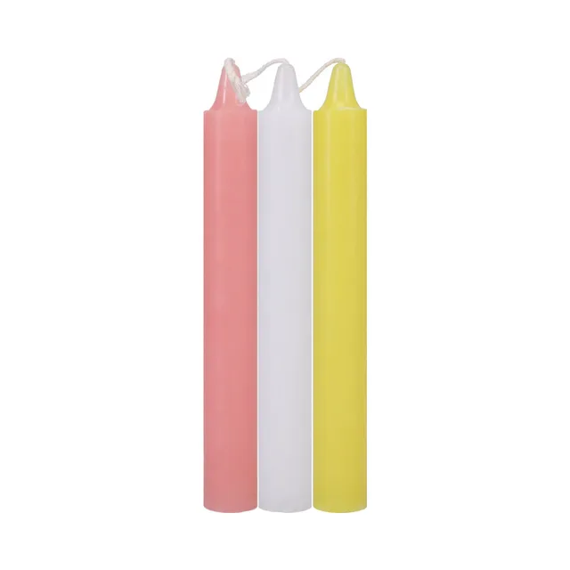 Doc Johnson Japanese Drip Candles pink, white and yellow wax candles together