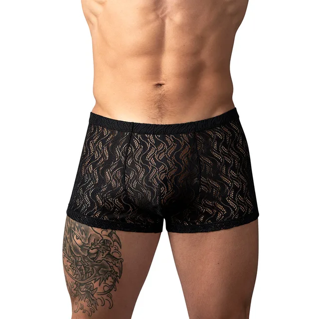 Male Power Ripple Pouch Short in black size XL worn from the front to show the ripple-pattern mesh