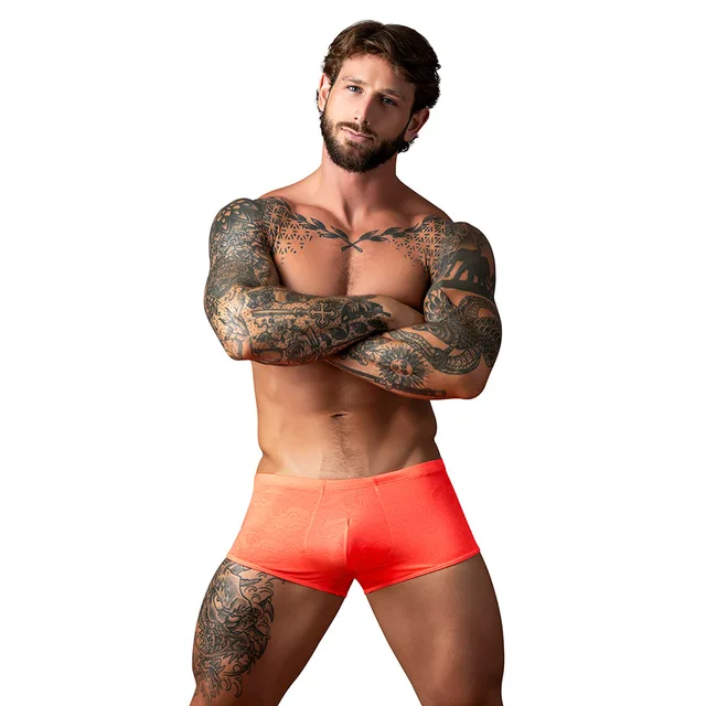 Front Model of coral-orange Male Power Kilauea Mini Short in size S