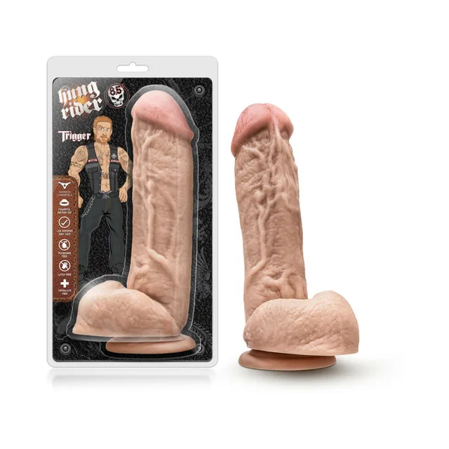 Hung Rider Trigger beige dildo beside retail package