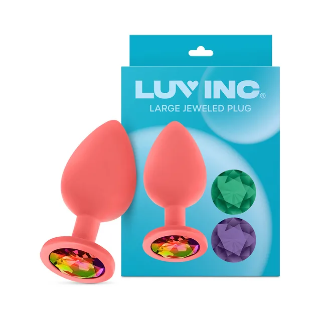 Coral Luv Inc JP33 large plug beside box and three gems