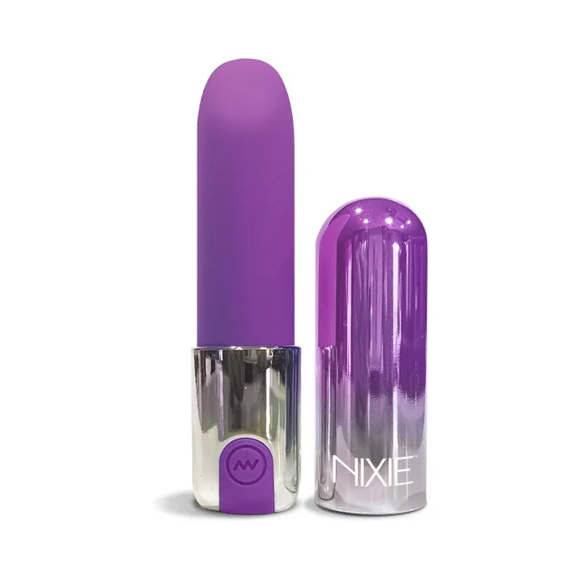 upright purple Nixie Smooch vibrator beside its transparent lipstick cap