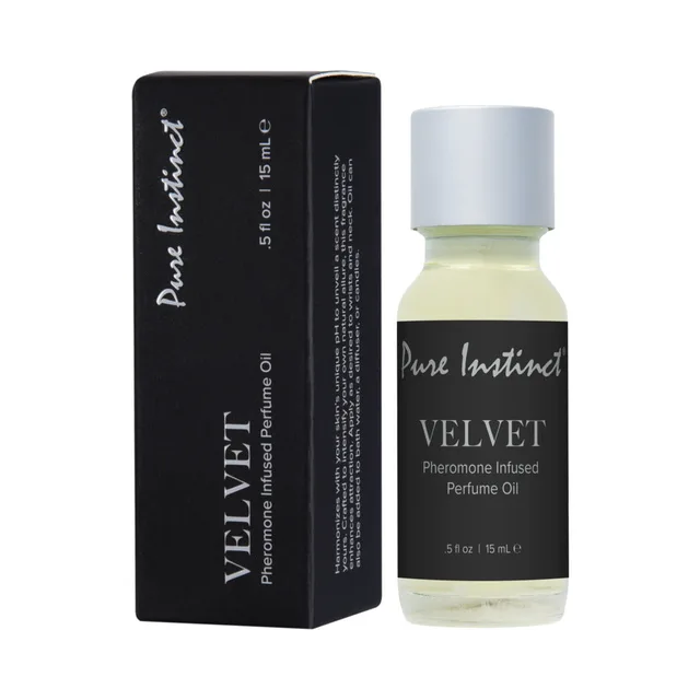 Pure Instinct Velvet perfume oil 0.5 oz glass dropper bottle beside black carton