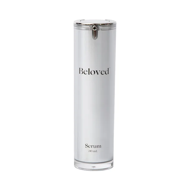 Front view of reflective silver Beloved Intimacy Serum bottle