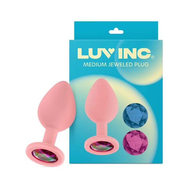 Pink Luv Inc JP32 medium plug beside box and three gems