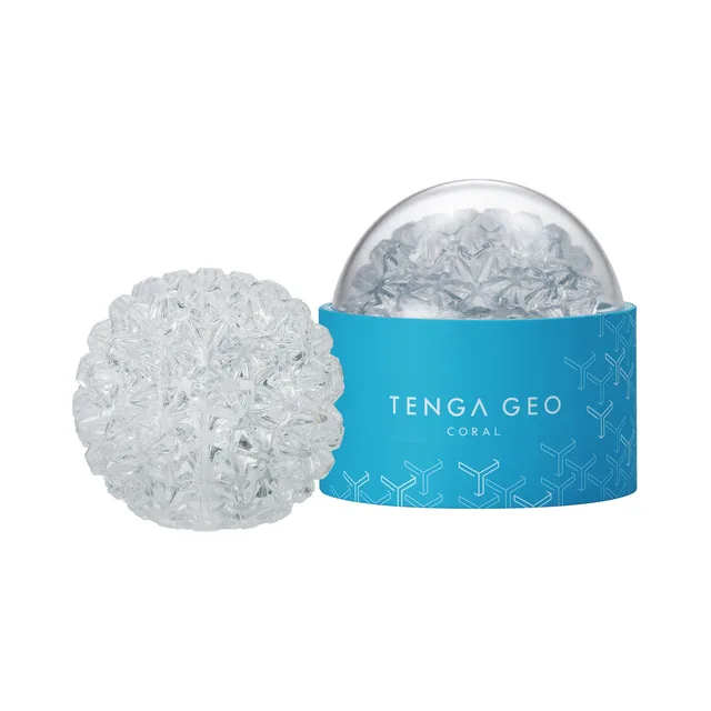 TENGA GEO Coral clear stroker clear nodule-textured sphere beside the turquoise storage base