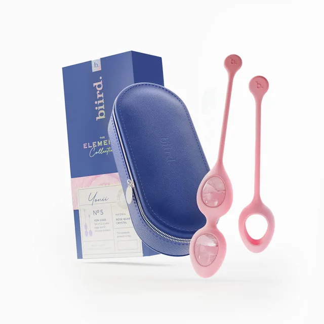 Biird Yonii quartz eggs beside blue zippered case and retail box