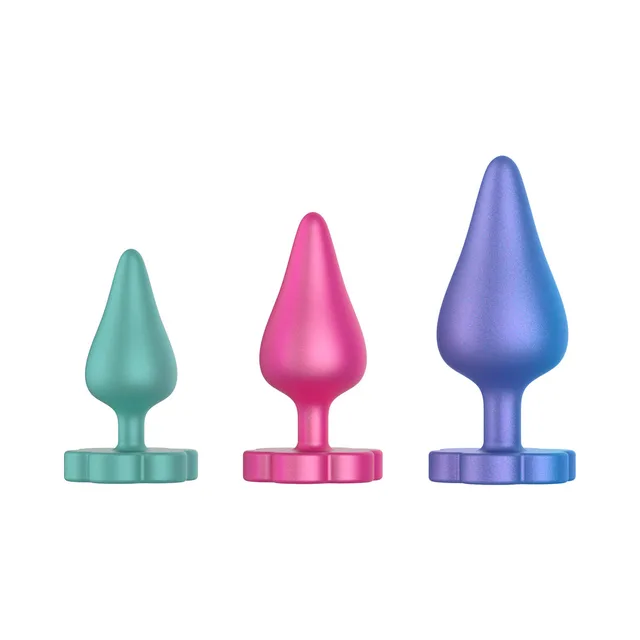 Front view of three Luster plugs increasing from teal to pink to blue