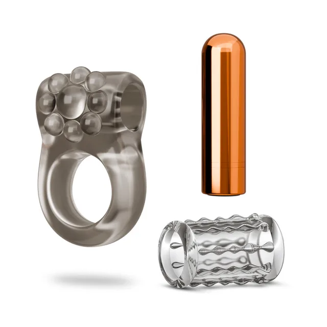 Blush Stay Hard vibrating ring set 1 components separated beside a copper-tone bullet