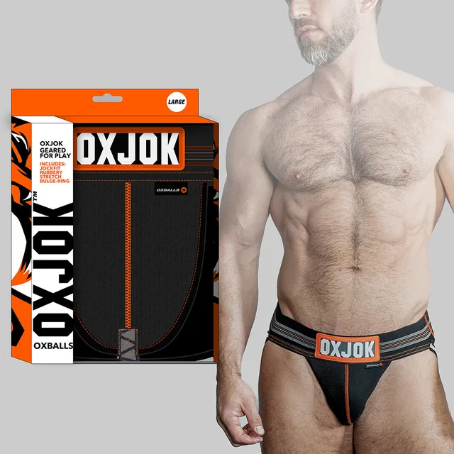 Oxballs Oxjok black ribbed jockstrap modeled beside retail box