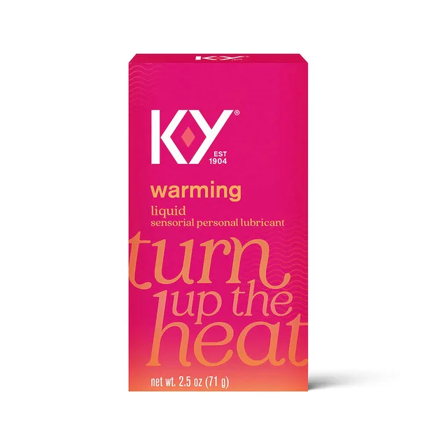 Bright pink K-Y Warming Liquid 2.5 oz carton with orange lettering and white logo