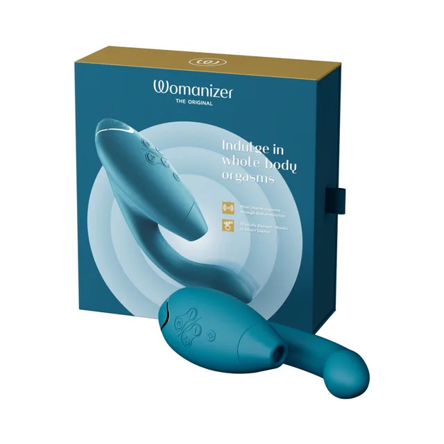 Womanizer Duo 2 petrol vibrator beside teal retail box