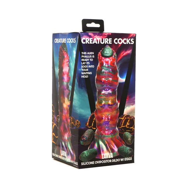 multicolor Larva ovipositor dildo and rounded eggs displayed on box