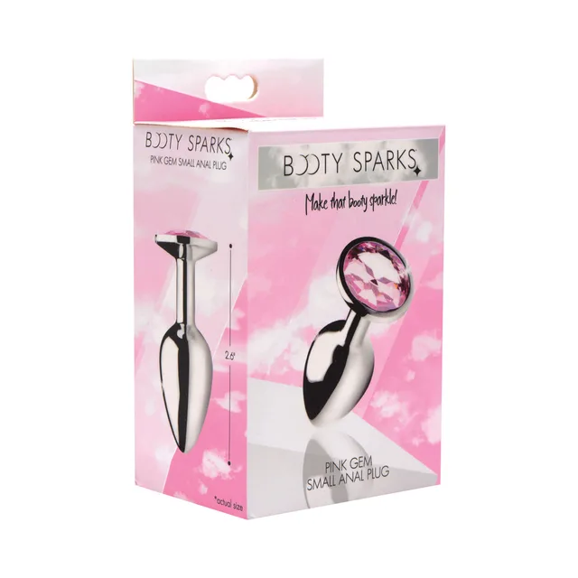 small silver Booty Sparks anal plug with faceted pink gem base on box