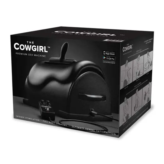 The Cowgirl black riding machine rounded saddle-shaped body beside black retail box with side circular opening