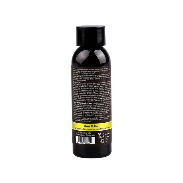 Angled dark Beach Daze massage oil bottle with black cap