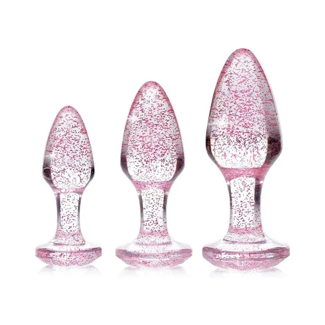 Adam & Eve pink glitter acrylic plug set three plugs arranged upright by size