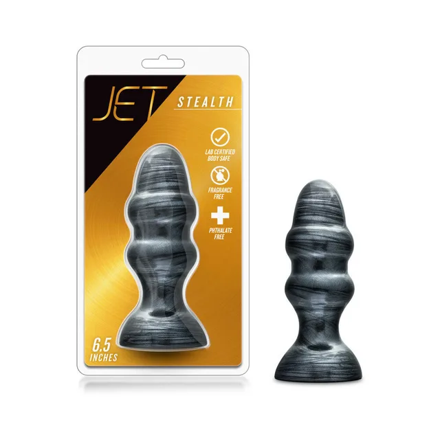Blush Jet Stealth Carbon Metallic Black Plug beside clear retail package