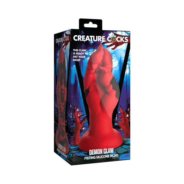 Creature Cocks Demon Claw red silicone hand dildo beside illustrated retail box