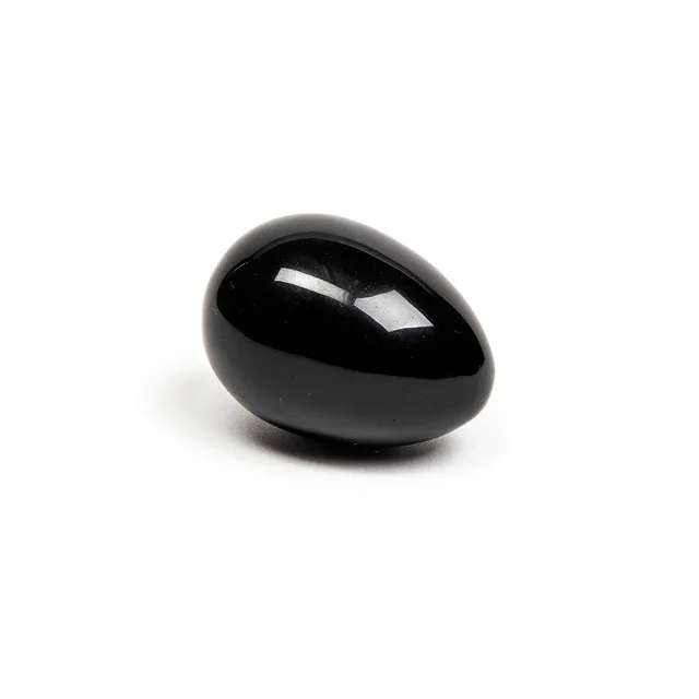 Angled side view of polished Xaga black obsidian egg