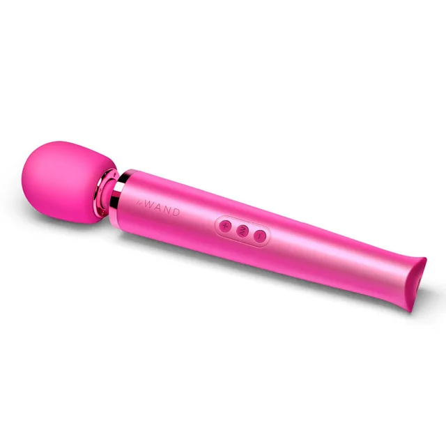 Angled view of magenta Le Wand and three control buttons