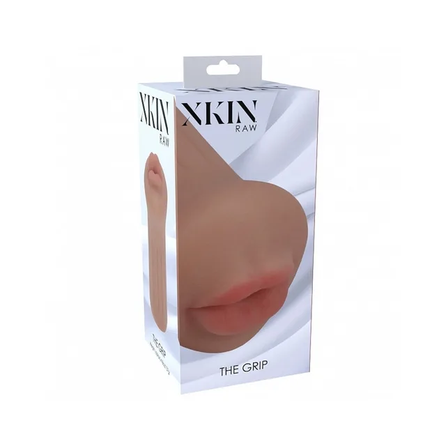 Xkin Raw The Grip tan stroker in white geometric carton