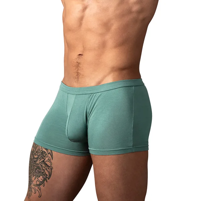 Male Power Eco Cozy Pouch Short in green size XL worn from the front to show the contoured pouch and square legs