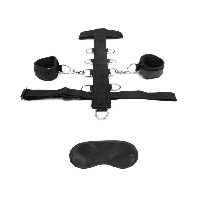 Black Lux Fetish neck band and two wrist cuffs laid flat