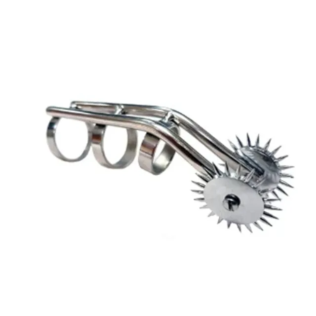 Silver Rouge pinwheel cat claw with three finger loops and two spiked wheels