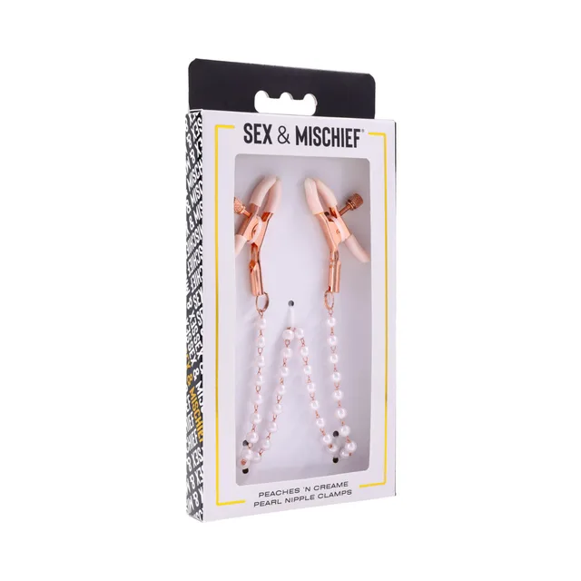 rose-gold nipple clamps with white rubber tips and pearl chain strands in box