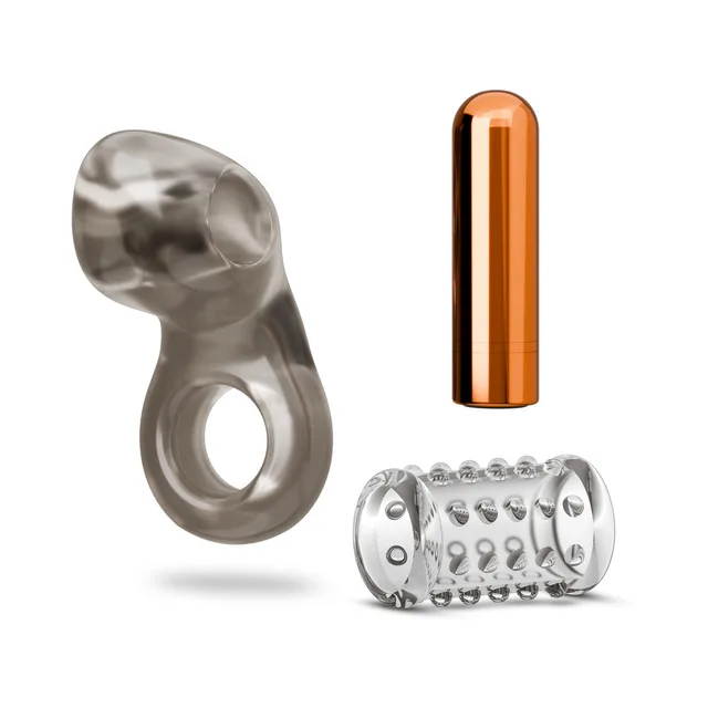 Blush Stay Hard vibrating ring set 2 components separated beside a copper-tone bullet