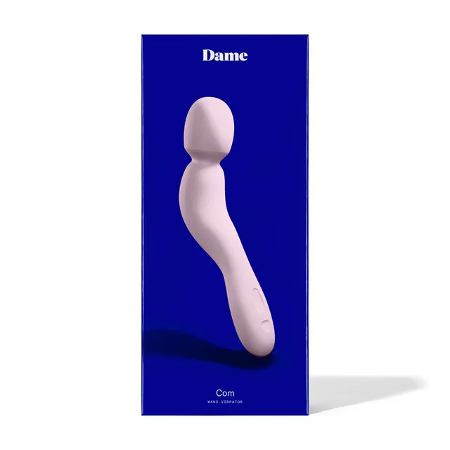 Dame Com Quartz wand vibrator beside blue retail box