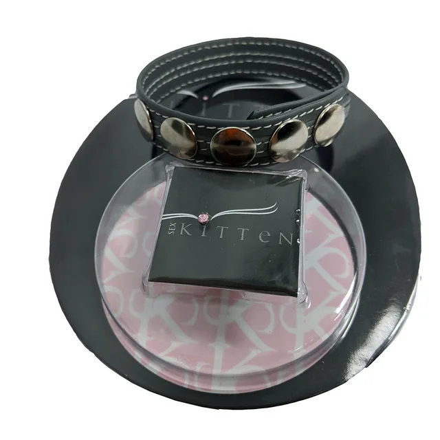 coiled black leather five-snap ring with silver hardware and branded end tab