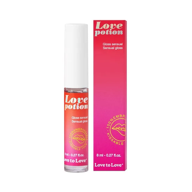 Love Potion sensual gloss roll-on bottle beside bright pink box
