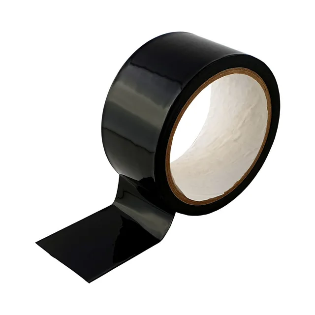 Glossy black Prowler RED bondage tape roll partly unrolled