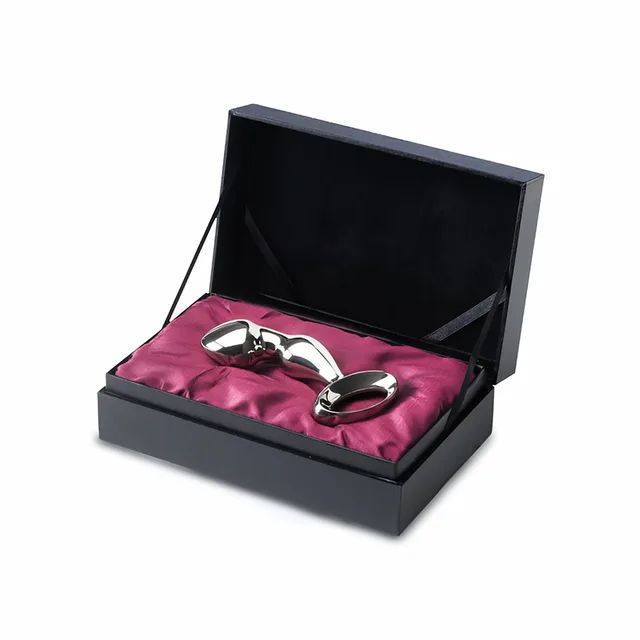 curved polished Njoy Pfun steel plug with open ring handle in a black satin box