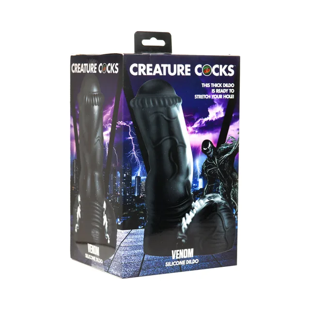 Creature Cocks Venom black textured dildo beside dark illustrated retail box