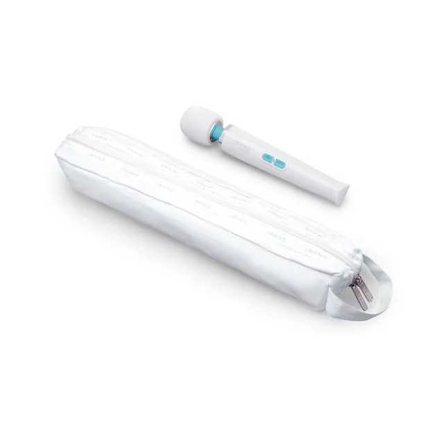 White Le Wand Classique Petite beside white storage pouch