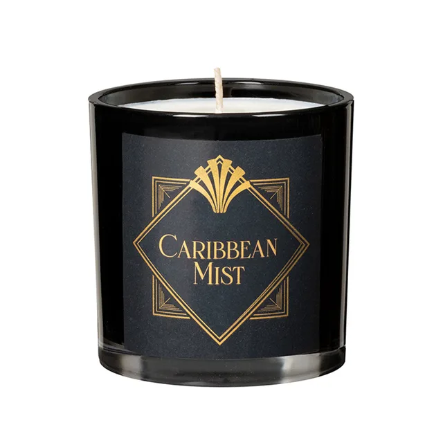 black glass Olivia's Boudoir Caribbean Mist candle with white wax and single wick