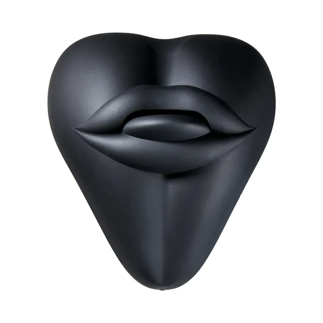 Front view of black Banana Pants Kissi heart-shaped cushion