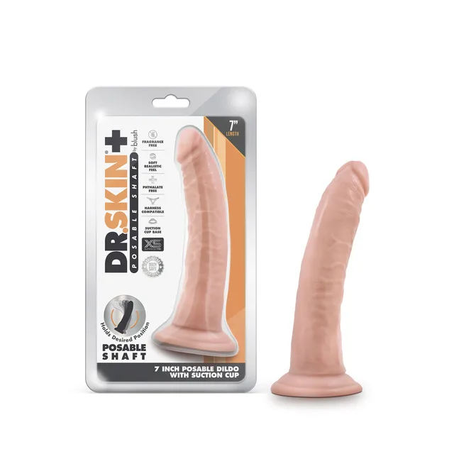 Beige Dr. Skin Plus 7-inch posable dildo beside retail package