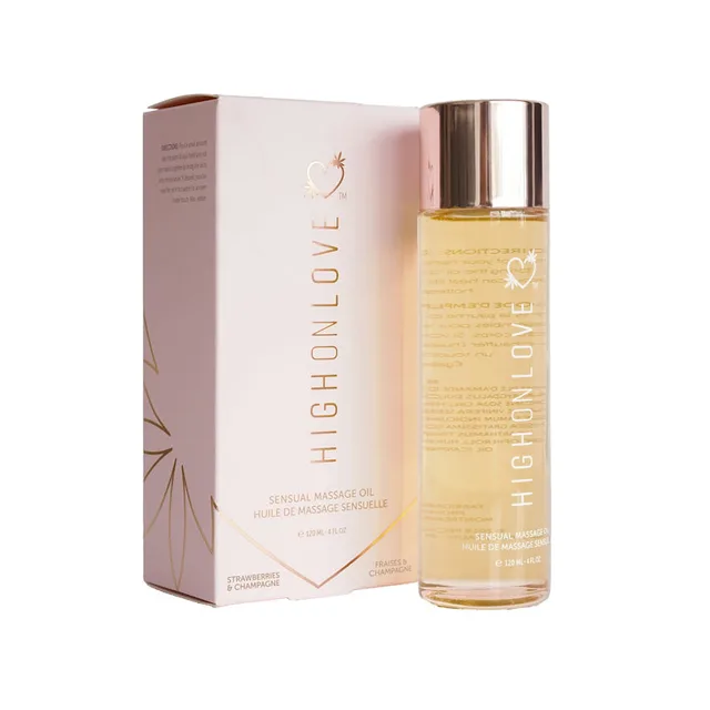 HighOnLove Strawberries and Champagne oil in clear bottle beside pink carton