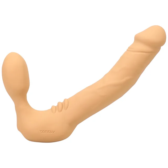 Honey Tantus Real Strapless showing curved shaft bulb and textured saddle