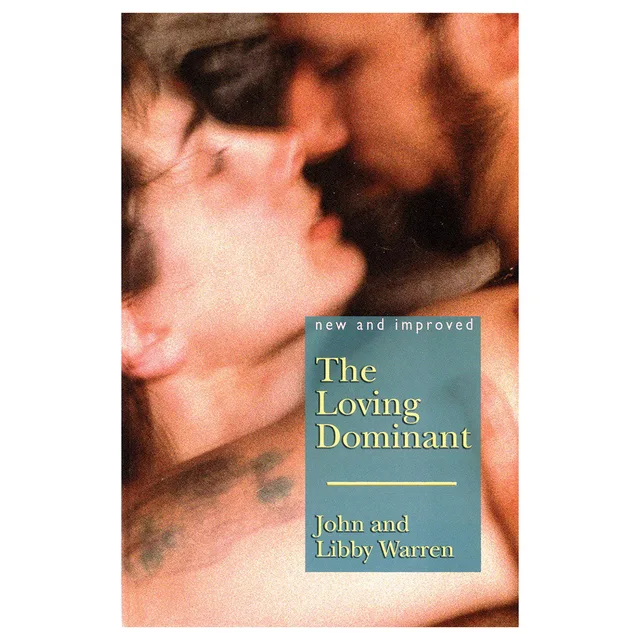 Loving Dominant paperback with cropped couple photograph and small teal title panel