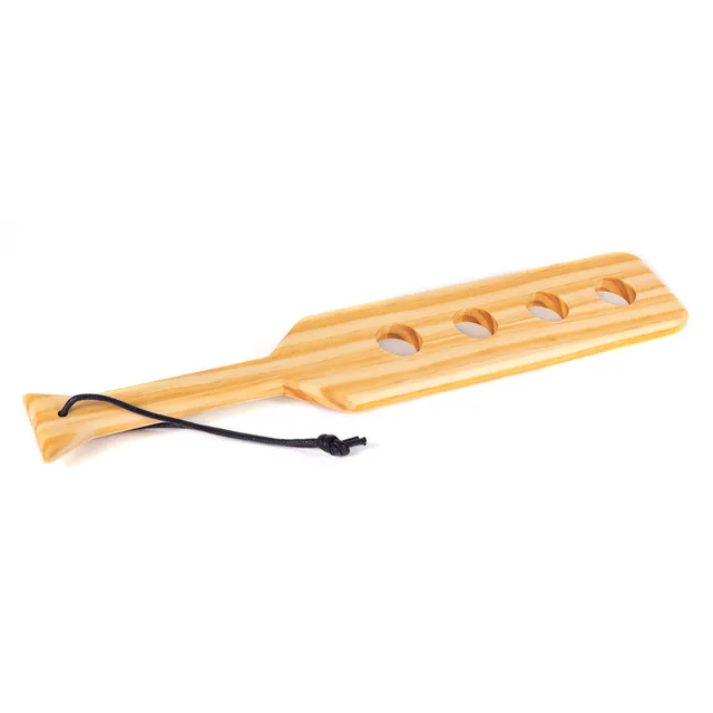 Spartacus light pine wood paddle with four oval holes and black wrist loop