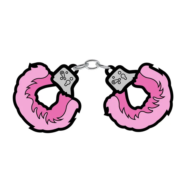 Close-up of pink cuff pin pieces linked by a short metal chain