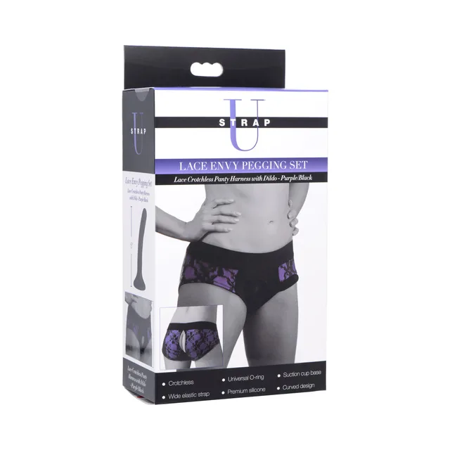 Purple-black Strap U Lace Envy harness and purple dildo on retail box