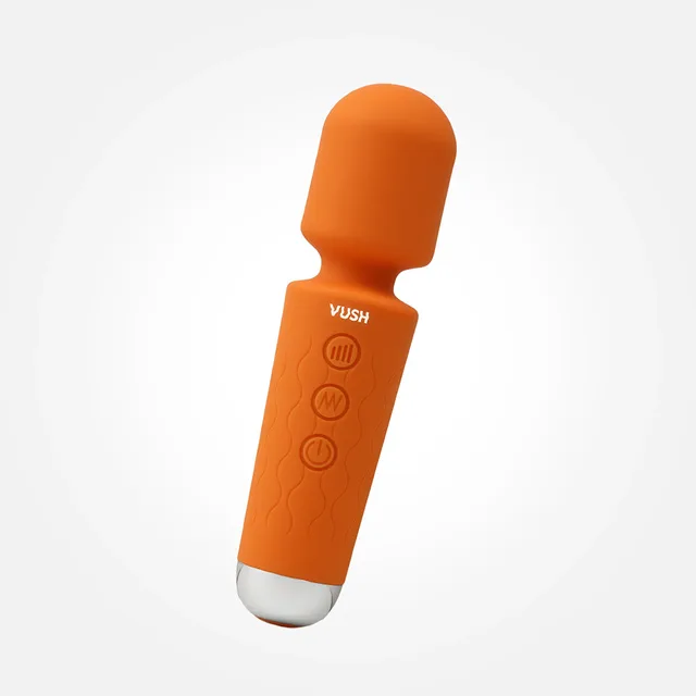 Front angled view of orange Mini Wand and three buttons
