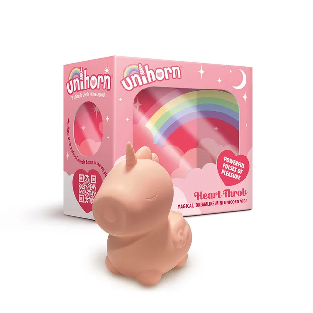 Creative Conceptions Unihorn Heart Throb pink unicorn vibrator beside rainbow retail box